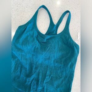 Lululemon size 8 teal tank. Barely worn. Great condition.